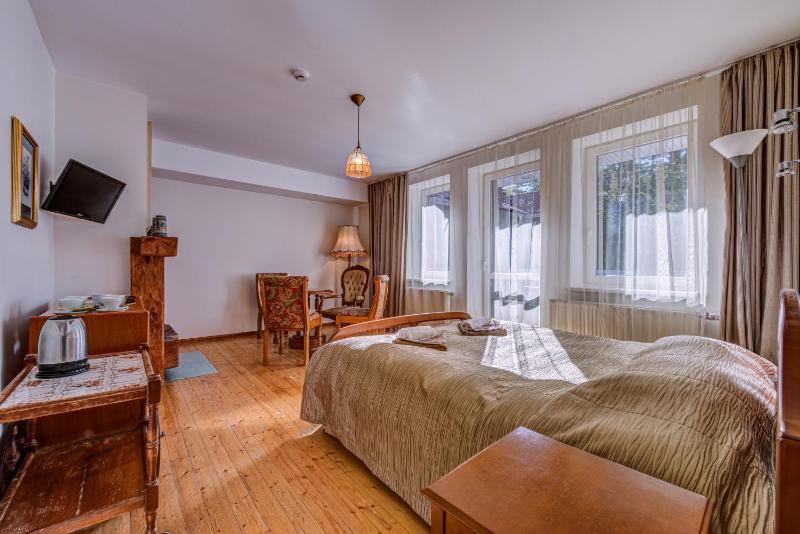 Suite with Balcony and Fireplace image 1