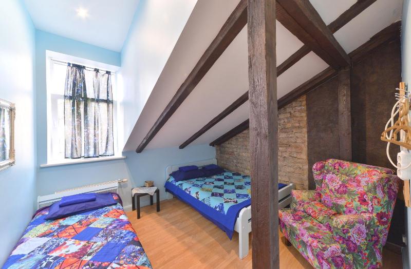 Family Room with Shared Bathroom image 3