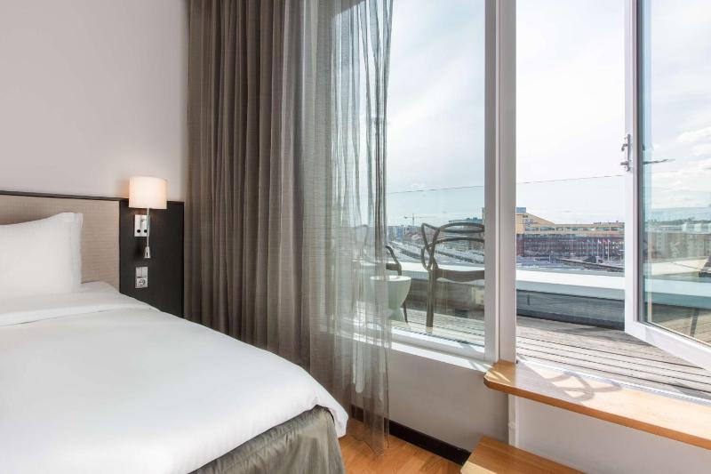 Standard Room with City View and Balcony image 1