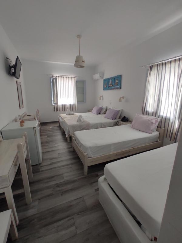 Budget Triple Room with Street view | No Balcony image 4