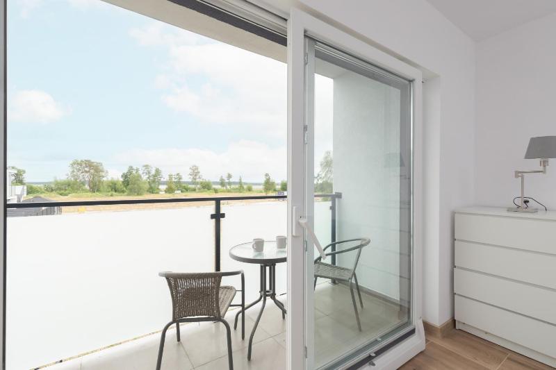 Lake House Sosnowy Las Mielno by Noclegi Renters - image 17