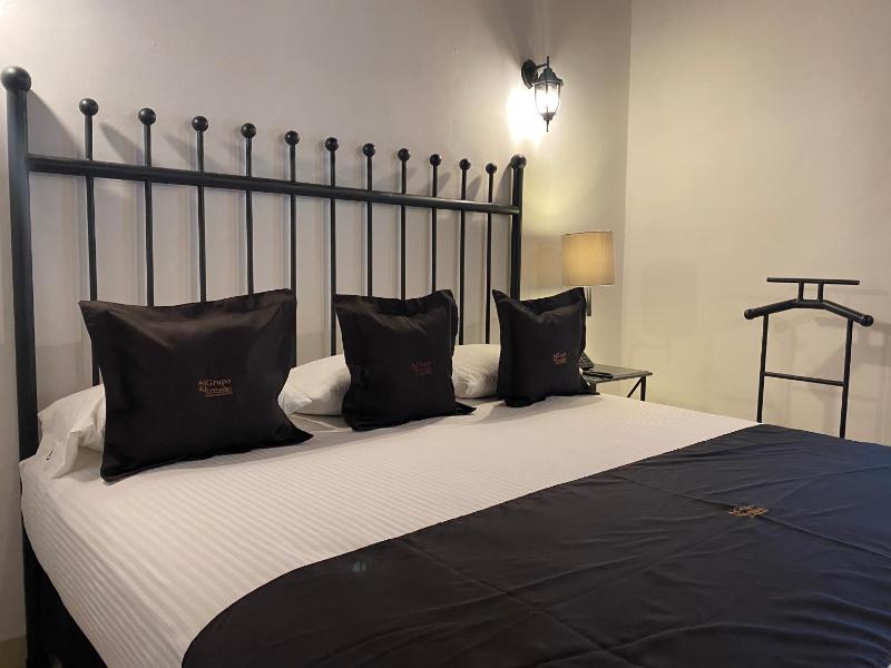 Queen Room with Balcony image 1