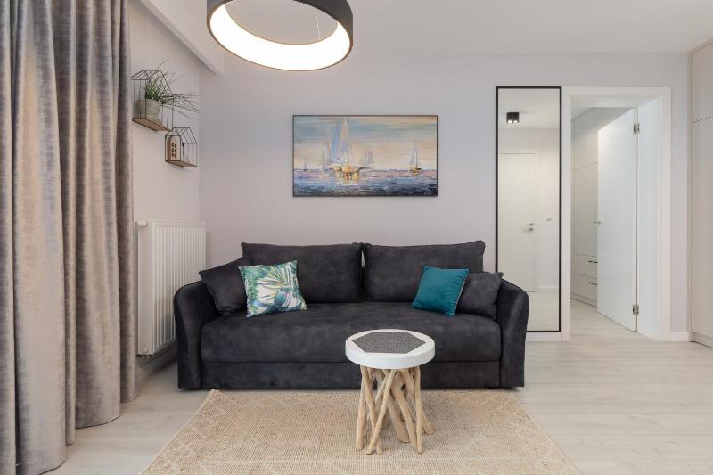 Mielno Sea & Lake Apartment by Noclegi Renters - image 1