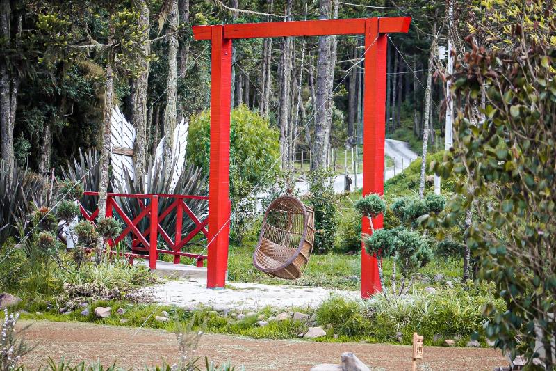Chalés e Suítes Jardim do Buda com piscina aquecida - image 14