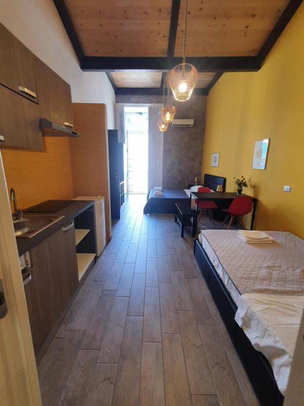 Quadruple Room with Private Bathroom image 2