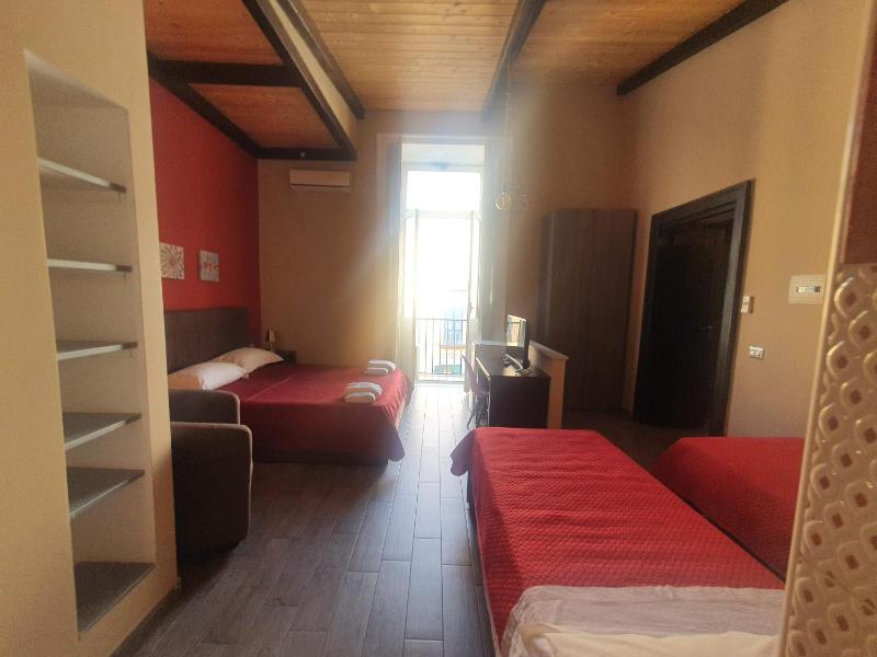 Quadruple Room with Balcony image 2