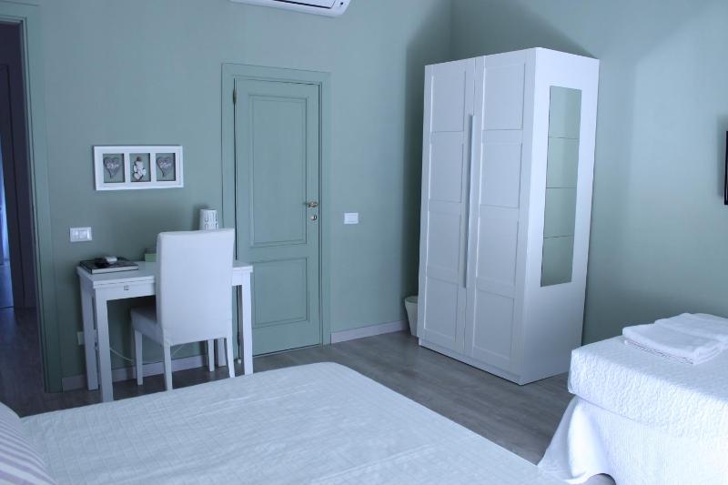 Quadruple Room with Private Bathroom image 1