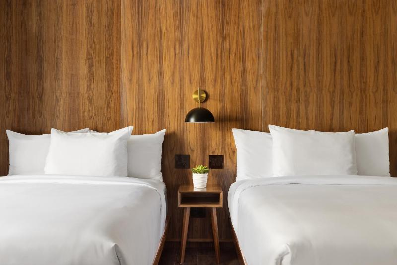 Double Room with Two Double Beds and Shower - Accessible image 4