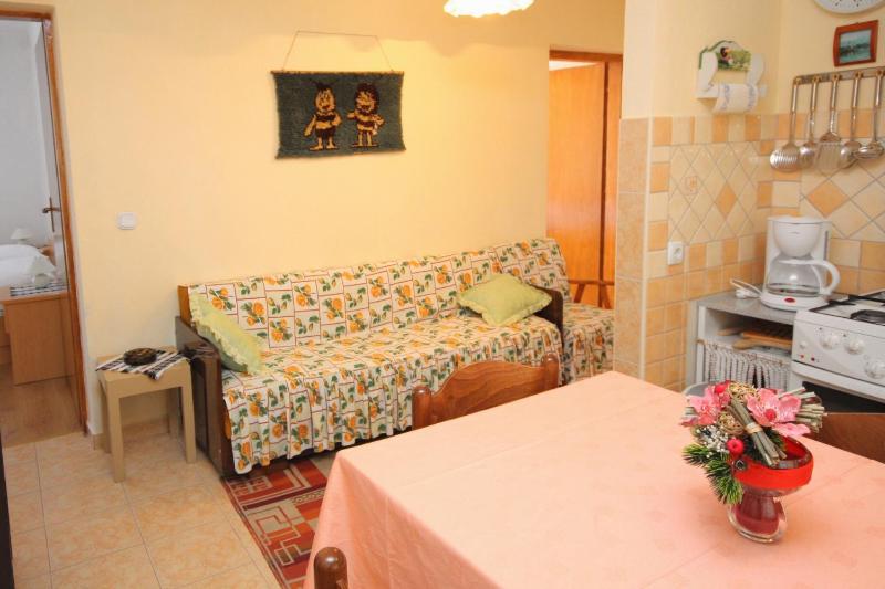 Apartments with parking space Palit Rab - 4957 - image 2