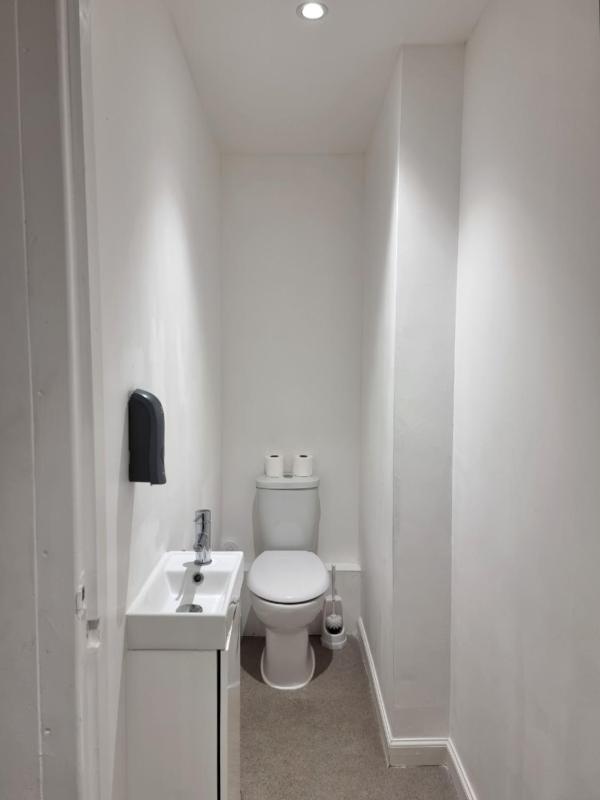 Family Room with Shared Bathroom image 4