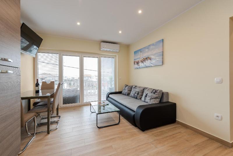 One-Bedroom Apartment with Terrace and Sea View image 1