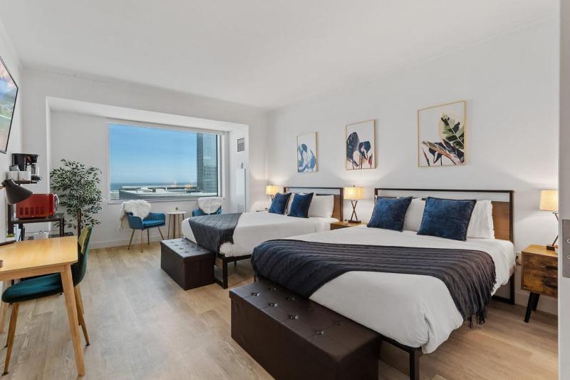 Beachfront Double Queen - CozySuites Images