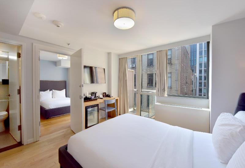 Premium Suite with Two Double Beds with Balcony image 1