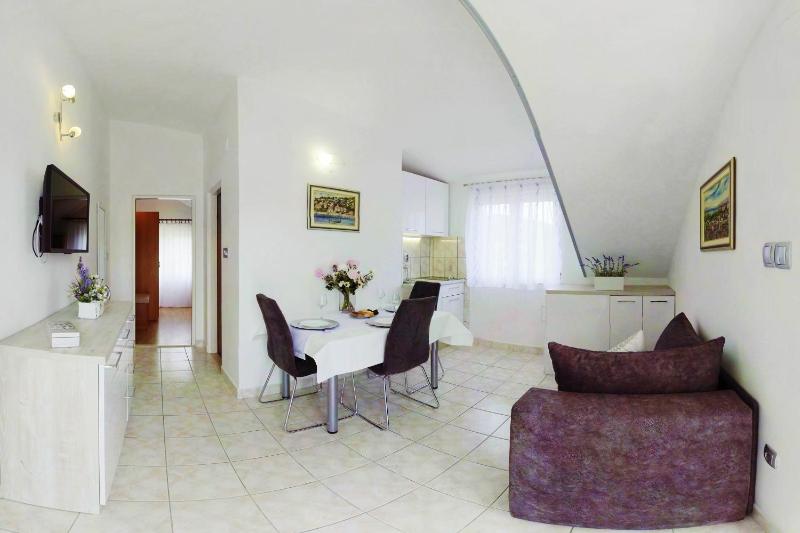 One-Bedroom Apartment with Balcony and Sea View image 1