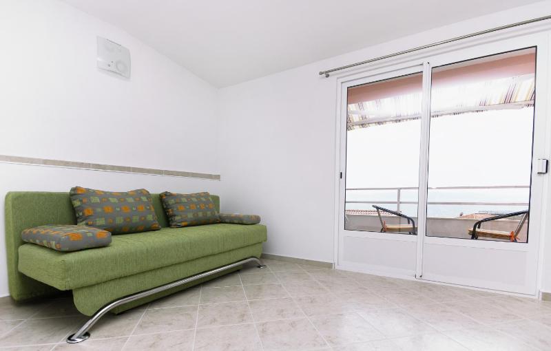 One-Bedroom Apartment with Balcony and Sea View image 1