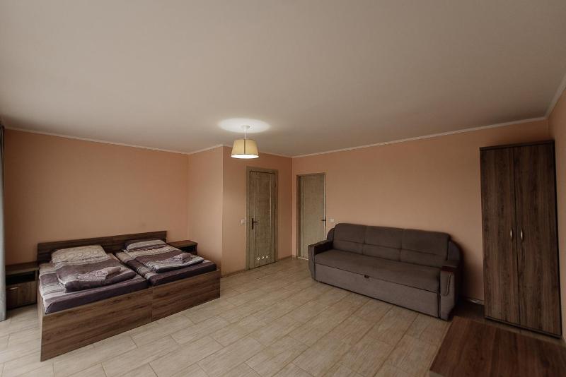 Deluxe Quadruple Room with Balcony image 1