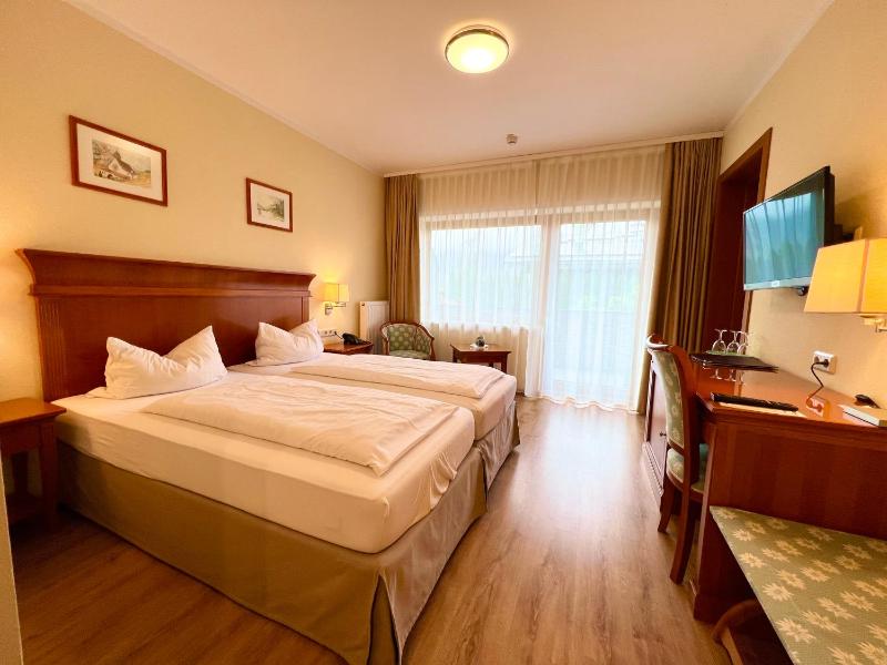 Family Room with Balcony or Terrace image 1