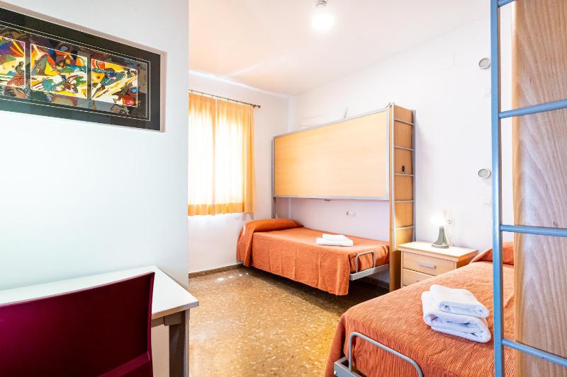 Single Bed in Dormitory Room image 3