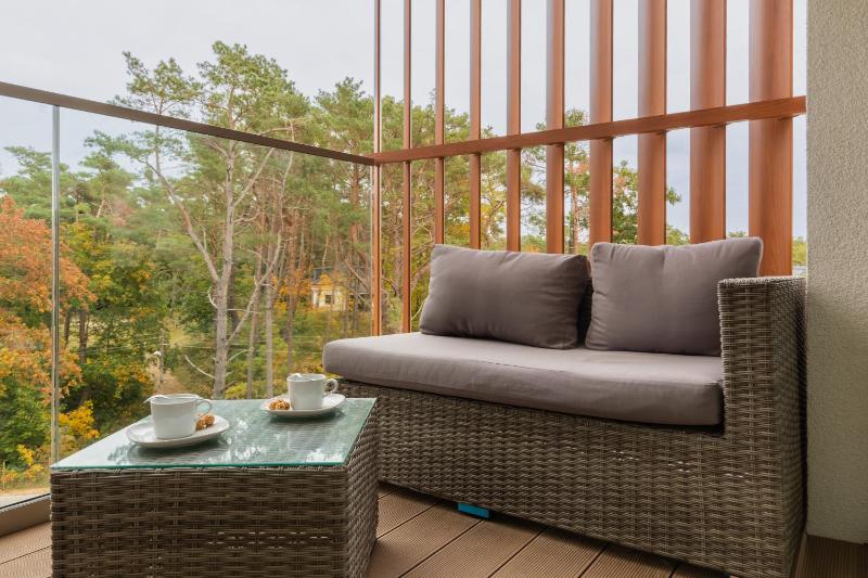 Mazowiecka Apartments Close to the Beach Access to Swimming Pool Sauna & Jacuzzi Parking by Noclegi Renters - image 11