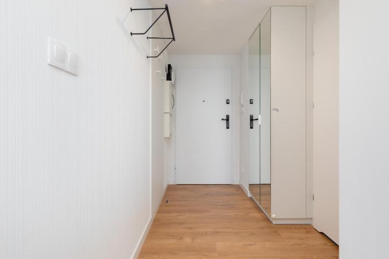 Mazowiecka Apartments Close to the Beach Access to Swimming Pool Sauna & Jacuzzi Parking by Noclegi Renters - image 9