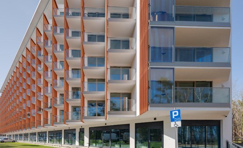 Mazowiecka Apartments Close to the Beach Access to Swimming Pool Sauna & Jacuzzi Parking by Noclegi Renters - image 10