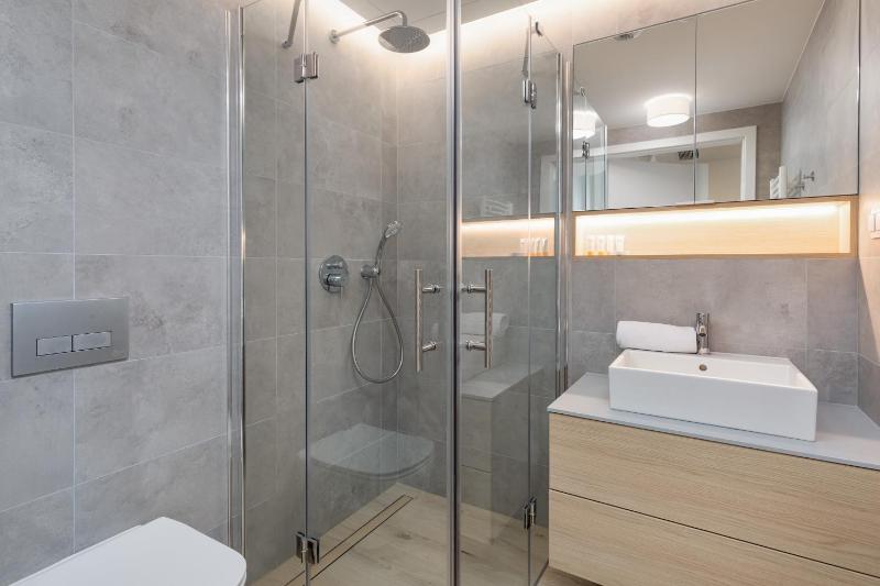 Mazowiecka Apartments Close to the Beach Access to Swimming Pool Sauna & Jacuzzi Parking by Noclegi Renters - image 49