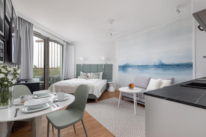 Mazowiecka Apartments Close to the Beach Access to Swimming Pool Sauna & Jacuzzi Parking by Noclegi Renters - image 22
