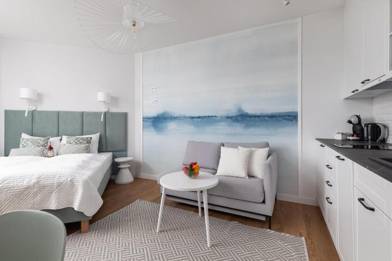 Mazowiecka Apartments Close to the Beach Access to Swimming Pool Sauna & Jacuzzi Parking by Noclegi Renters - image 27