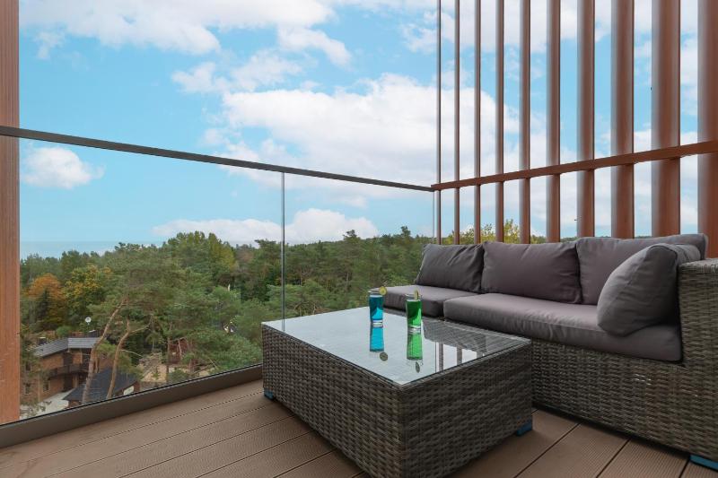 Mazowiecka Apartments Close to the Beach Access to Swimming Pool Sauna & Jacuzzi Parking by Noclegi Renters - image 39