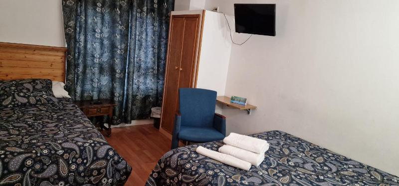 Triple Room (2 Adults + 1 Child) image 4