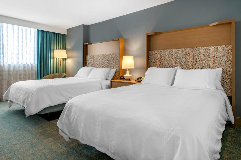 Standard Queen Room with Two Queen Beds and Balcony image 4