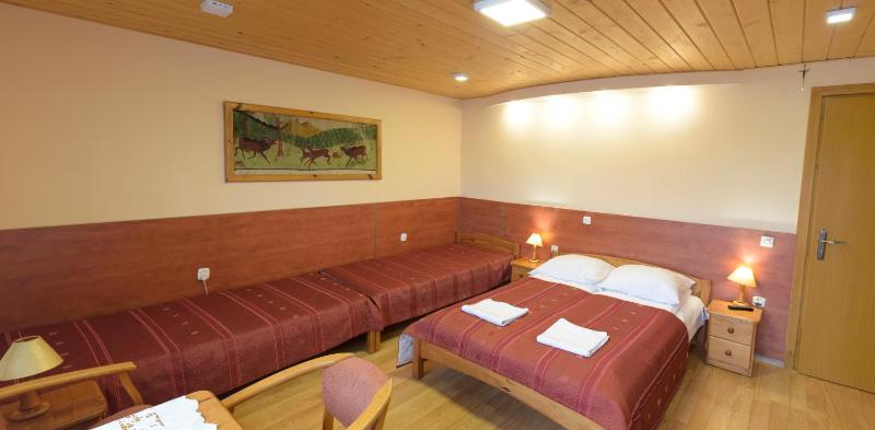 Quadruple Room with Private Bathroom image 1