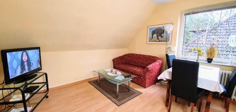 Ferienwohnung-Dueneneck-14-OG-links Images