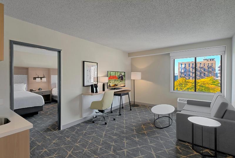 Queen Suite with Two Queen Beds and Sofa Bed image 3