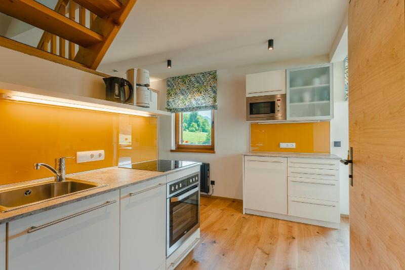 Two-Bedroom Apartment with Balcony and Lake View image 1