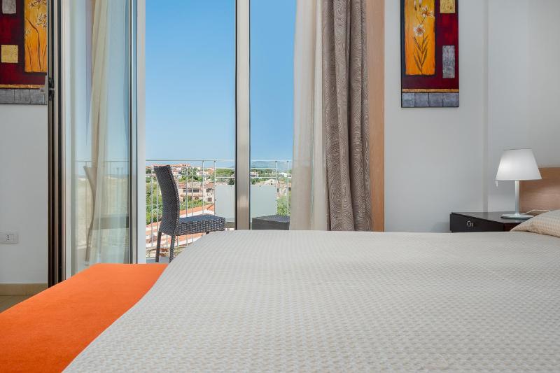 Double or Twin Room with Side Sea View image 3