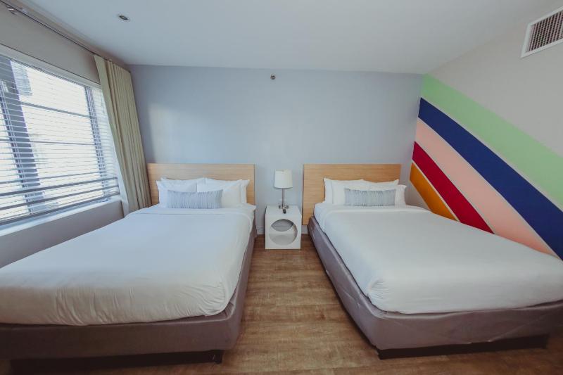 Deluxe Queen Room with Two Queen Beds image 3