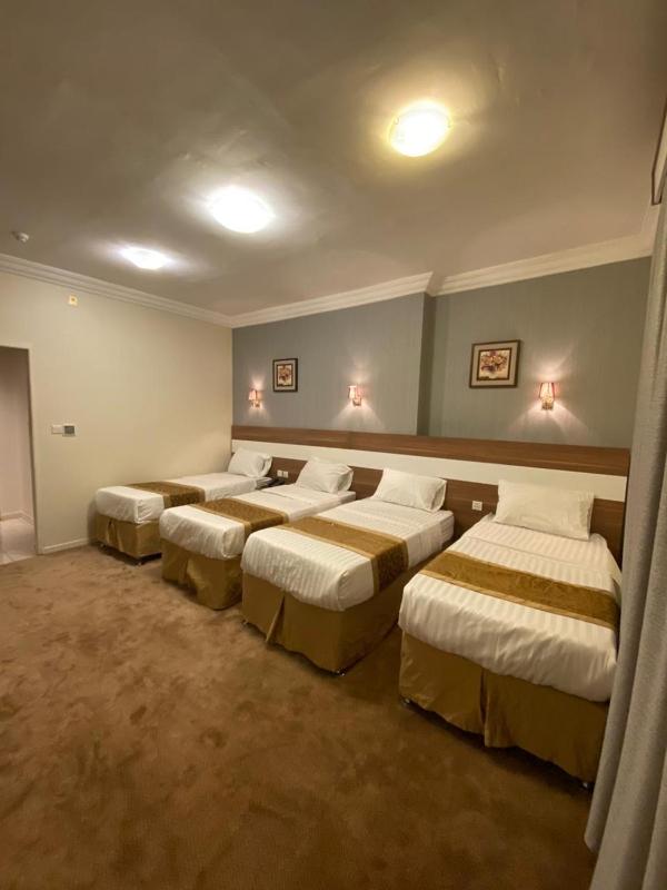 Quadruple Room with Private Bathroom