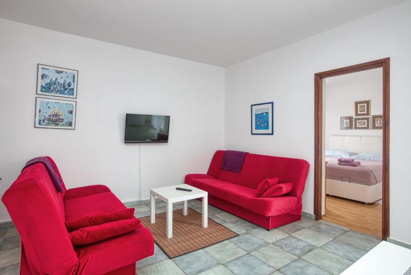 One-Bedroom Apartment with Terrace and Sea View image 1