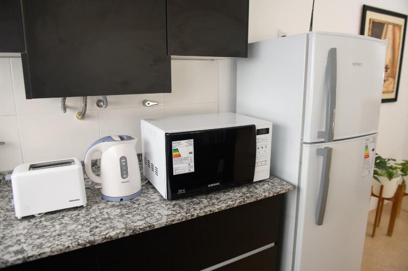 Departamento con terraza y quincho con asador - image 19