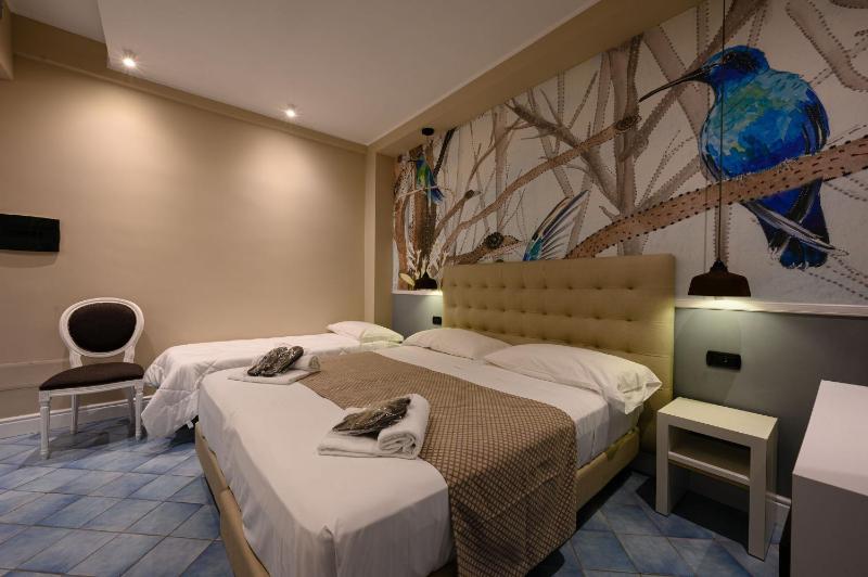 Superior Triple Room with Sea View image 3