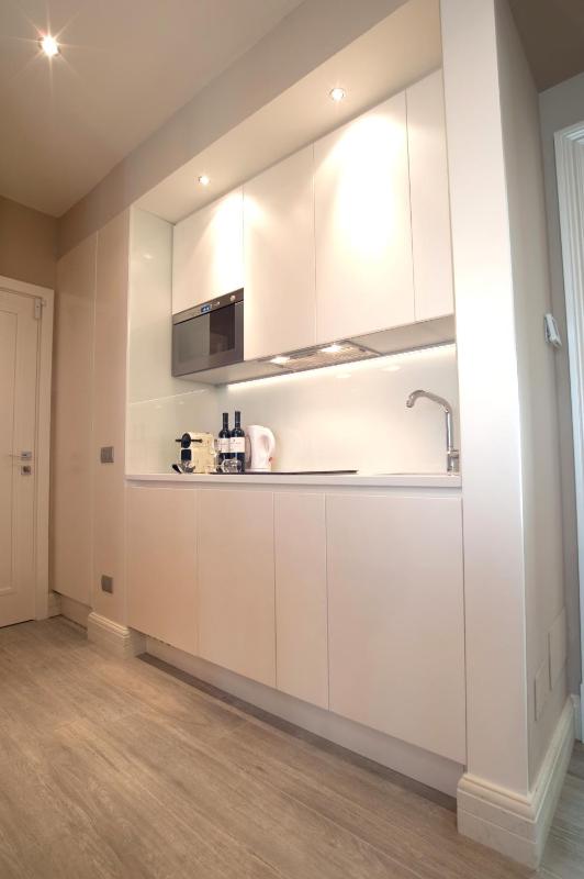 One-Bedroom Apartment with Balcony and City View image 4