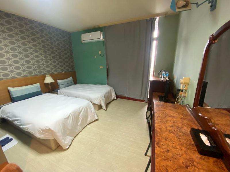 Jiuning Business Hotel - image 2