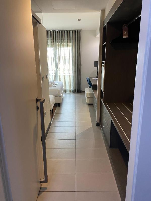 City Side Superior Triple Room with balcony and pool access image 2