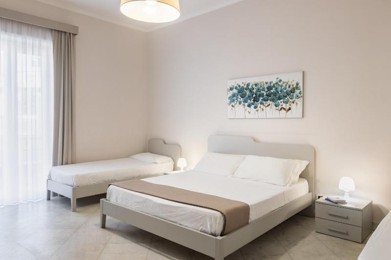 Quadruple Room with Balcony image 1