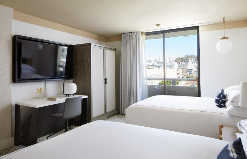 Essential Queen Room with Two Queen Beds and Balcony image 2