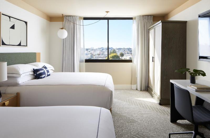 Essential Queen Room with Two Queen Beds and City View image 2