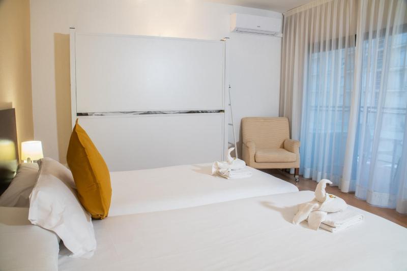 Double or Twin Room with Side Sea View image 3