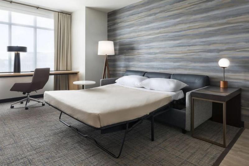 One-Bedroom Suite with Two Queen Beds and Sofa Bed - Hearing Accessible image 1