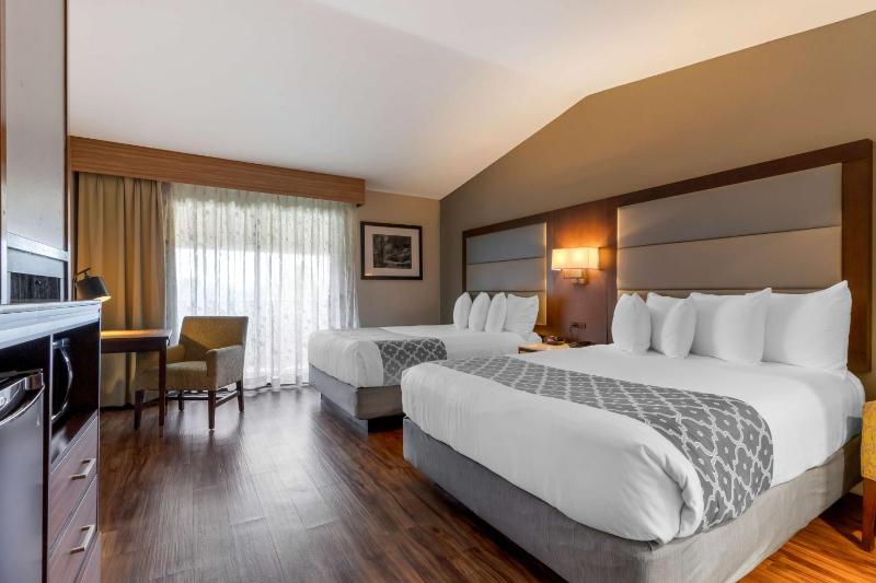 Queen Room with Two Queen Beds and Fireplace image 3